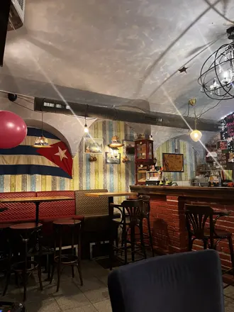 The vaulted room with the Cuban flag